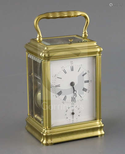 A late 19th century lacquered brass hour quarter repeating carriage alarum clock, with gorge case,