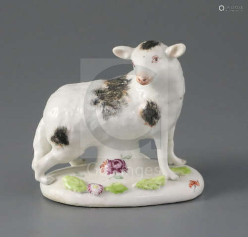A rare Longton Hall figure of a ewe, c.1752, standing on an oval base painted and applied with