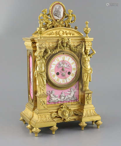 A late 19th century French ormolu and Sevres style porcelain mantel clock, of architectural form,