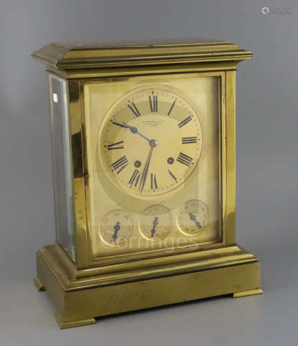 W. Thornhill & Co. A late Victorian gilt brass four glass calendar mantel clock, with gilt Roman