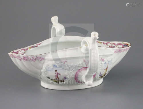 A very fine Worcester two-handled sauceboat, circa 1755-6, the shallow, oval body modelled with