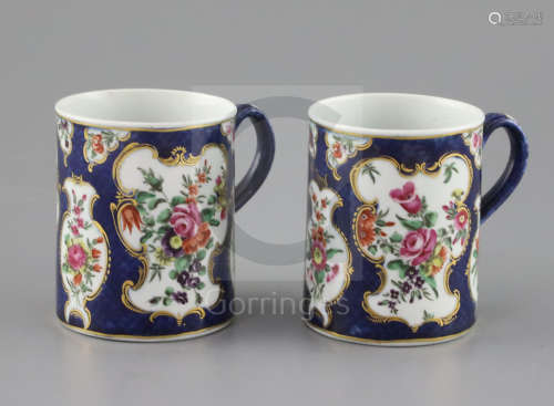A good pair of small Worcester mugs, circa 1768, of cylindrical form, painted with garlands of