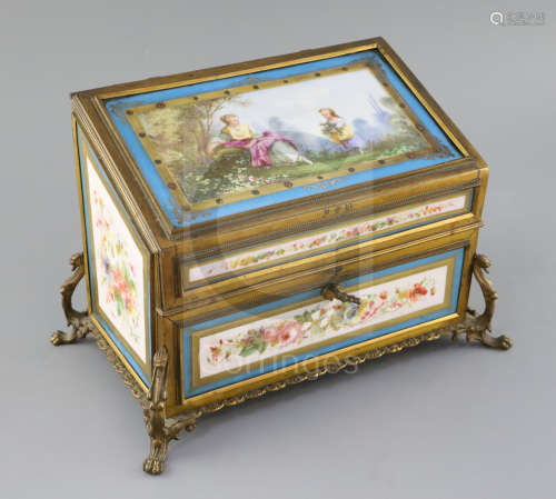 A Sevres style ormolu mounted stationery casket, late 19th century, the cover painted with a