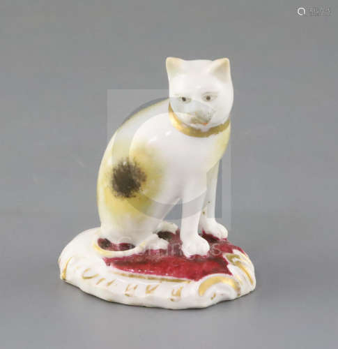 A rare Rockingham porcelain figure of a seated cat, c.1830, incised ' No. 77 1 fig.', red 'CL2',