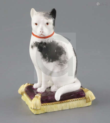A rare Minton porcelain figure of a cat seated on a cushion, c.1835, H. 12cmCONDITION: