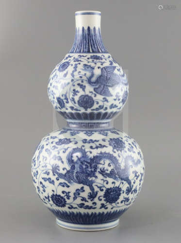 A Chinese blue and white '****** and phoenix' double gourd vase , Qianlon***ark but late 19th/