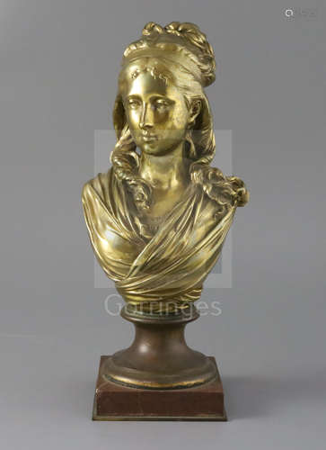 Carrier Belleuse. A late 19th century French ormolu bust of a young woman, with ribbon tied hair,