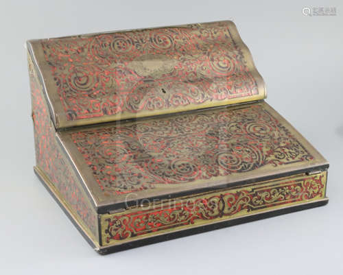 An early 20th century French red boulle work lap desk, the hinged lids enclosing a fitted interior