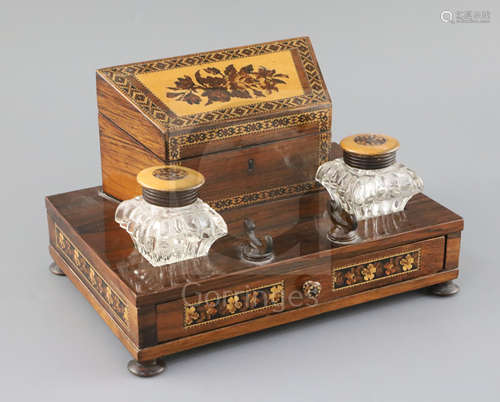 A 19th century Tunbridge ware rosewood and floral mosaic desk stand, the pair of glass inkwells with