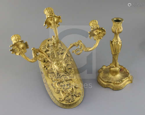 A 19th century French ormolu three branch wall light, with foliate scroll branches emitting from a