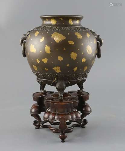 A fine and rare Chinese gold splashed bronze globular tripod vessel, 18th century,