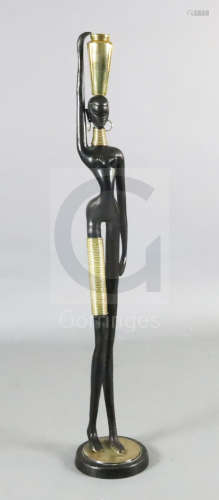 Karl Hagenauer. A brass and ebonised bronze figure of an African water carrier, with vase on her