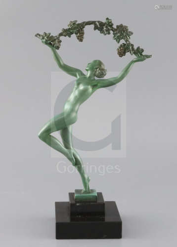 R. Guerbe for Max Le Verrier. A bronze model of a dancin***aiden holding aloft a g****vine, signed