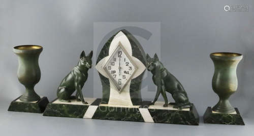 An Art Deco bronze and three colour marble clock garniture, with silvered dial and eight day