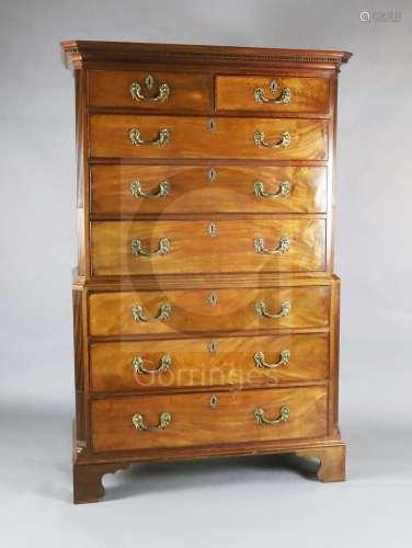 A George III maho***y chest on chest, with dentil cornice, two short and three graduated long
