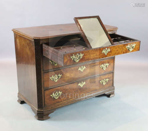 A George III maho***y Chippendale period dressing chest with fitted top drawer and three further