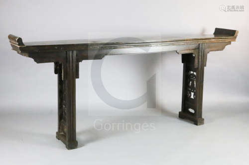 A 19th century Chinese hongmu altar table, with moulded frieze, legs inter*****d with fret work