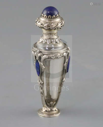 A 19th century French? white metal and lapis lazuli mounted rock crystal? scent bottle and glass