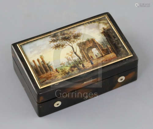 A 19th century Swiss tortoiseshell music box, of plain rectangular form, the lid inset with a glazed
