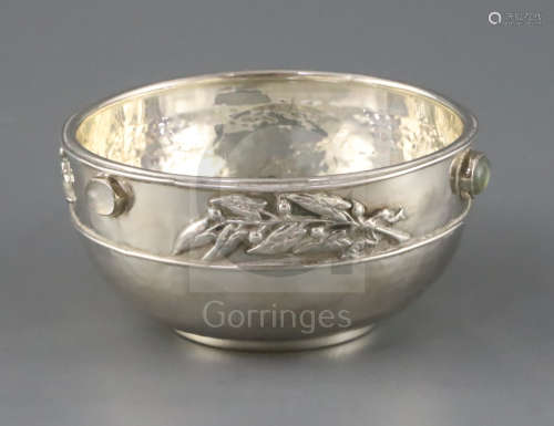 A George V Arts & Crafts planished silver and cabochon moonstone set bowl, by Sandheim Brothers, the