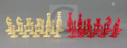 A late 18th century English white and red ivory chess set, in maho***y box, king 7cm tall, the
