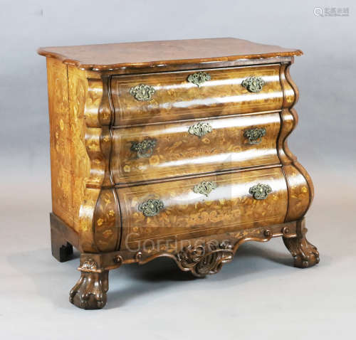 A 19th century Dutch walnut and marquetry bombe commode, with serpentine top and three drawers, on
