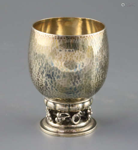A 1930's Danish Georg Jensen sterling silver cup, with fruiting vine foot, design no. 296, with