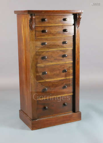 A Victorian maho***y Wellington chest, with crossbanded top and s***n drawers, on plinth foot, W.2ft