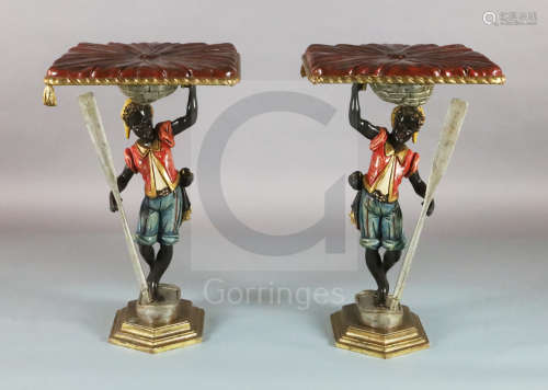 A pair of late 19th century Florentine carved and painted wood blackamoor occasional tables, with