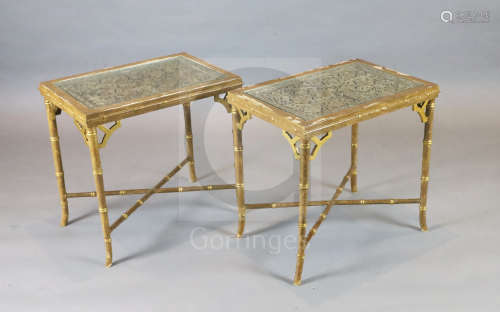A pair of 20th century lacquered gilt faux bamboo occasional tables, inset with glazed, carved and