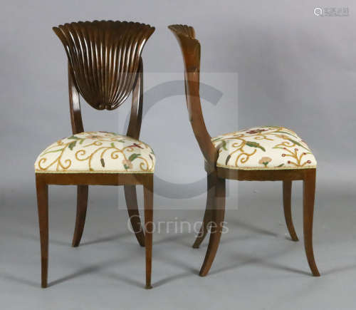 A set of six stylish 1950's Italian maho***y dining chairs, in the manner of Epstein, with fluted