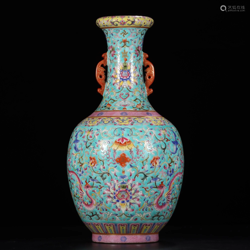 A TURQUOISE -GROUND FAMILLE-ROSE VASE.MARK OF …