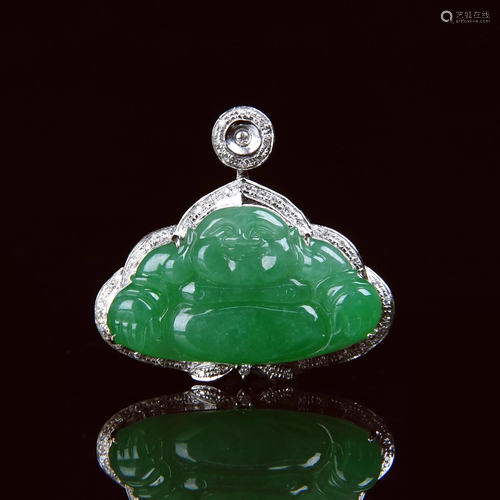 A CARVED JADEITE PENDANT