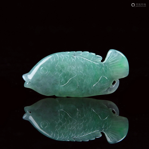 A CARVED JADEITE FISH PENDANT