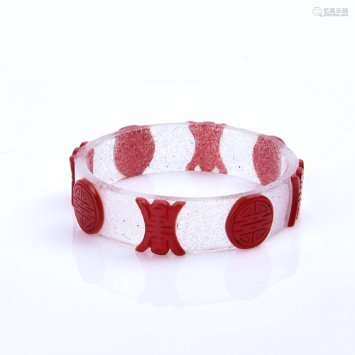 A RED-OVERLAY GL*** BANGLE