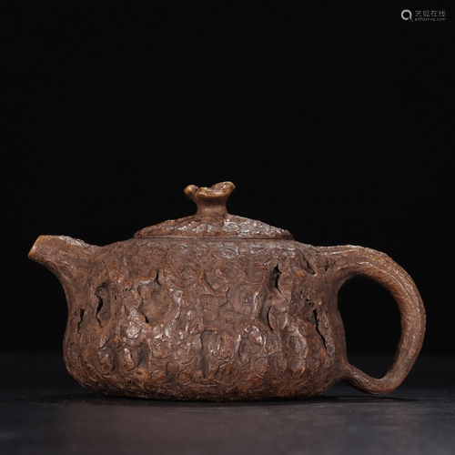 A YIXING TEAPOT AND COVER