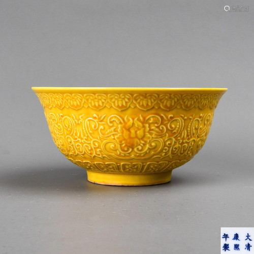 A CARVED YELLOW-GLAZED BOWL.MARK OF KA…