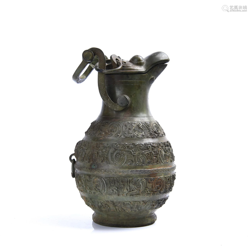 A BRONZE WINE VESSEL AND COVER