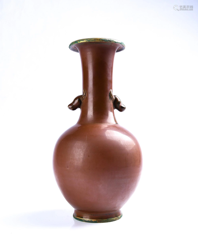 A BRONZE -GLAZED VASE