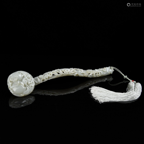 A CARVED WHITE JADE RUYI SCEPTER.QING PERIOD