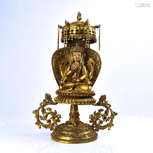 A GILT-BRONZE FIGURE OF MANJUSHRI.MING PERIOD