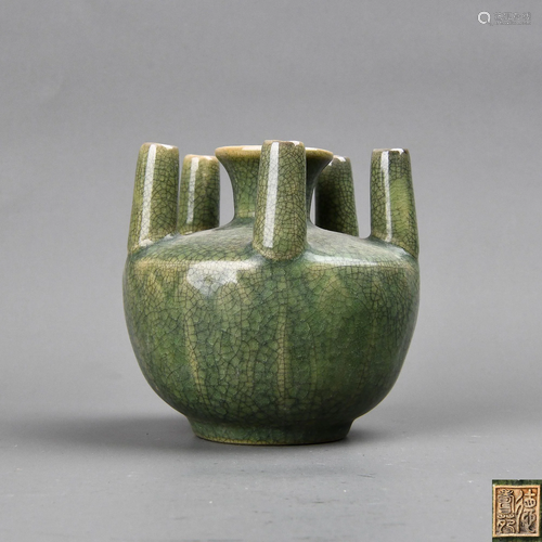 A CELADON-GLAZED VASE