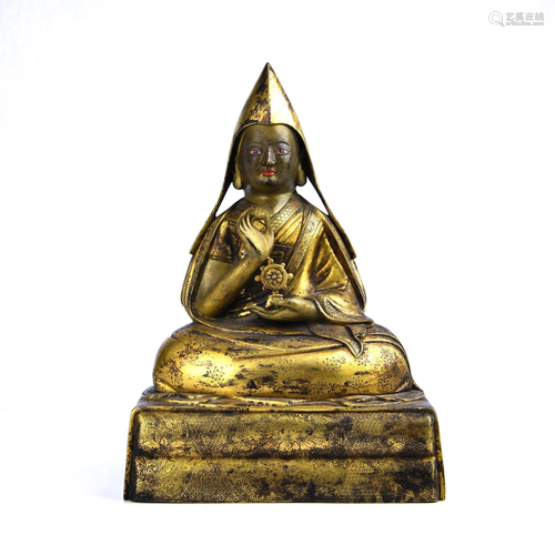 A GILT-BRONZE FIGURE OF TSONGKHAPA.QING PERI…