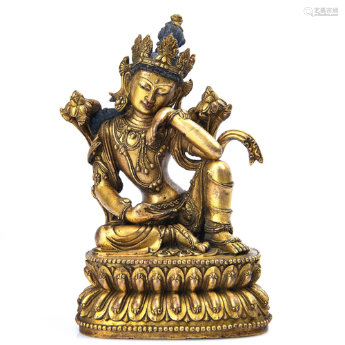 A GILT-BRONZE FIGURE OF GUANYIN.MING PERIOD