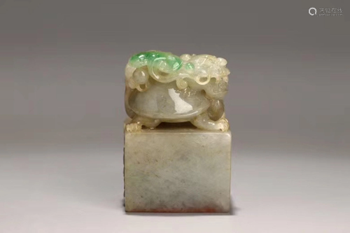 A CARVED JADEITE SEAL