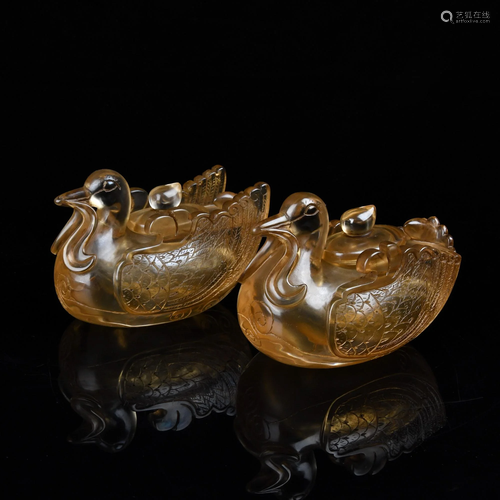 A PAIR OF CARVED CRYSTAL MANDARIN DUCK B…