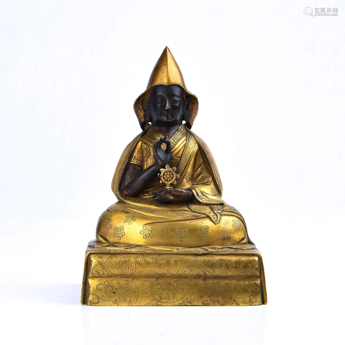 A GILT-BRONZE FIGURE OF TSONGKHAPA.QING PERI…