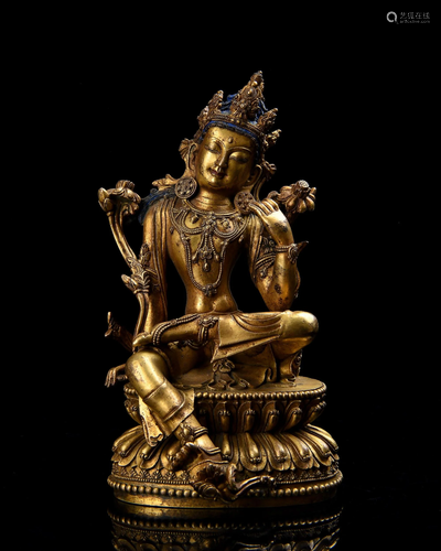 A GILT-BRONZE FIGURE OF GUANYIN.MING PERIOD