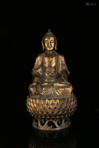 A GILT-BRONZE FIGURE OF SAKYAMUNI.MING PERIOD