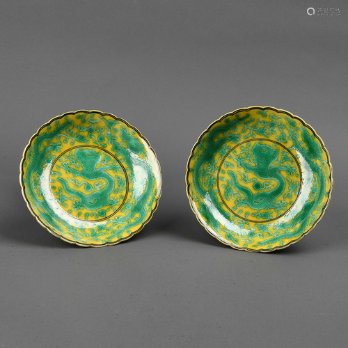 A PAIR OF YELLOW-GROUND GREEN-GLAZED 'DR…